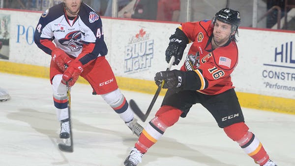 FORWARD PETER MacARTHUR MARKS FIRST ADIRONDACK SIGNING