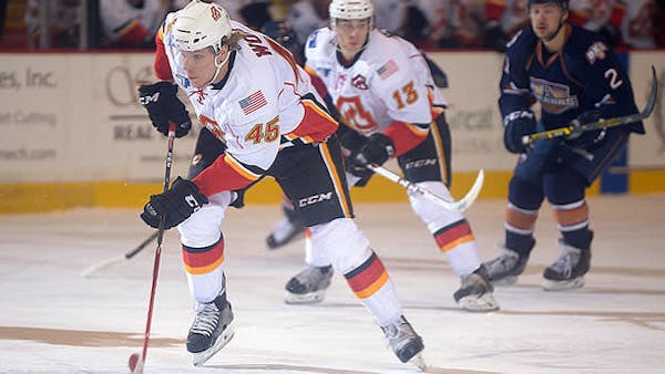 FLAMES NIPPED BY BARONS IN OVERTIME THRILLER