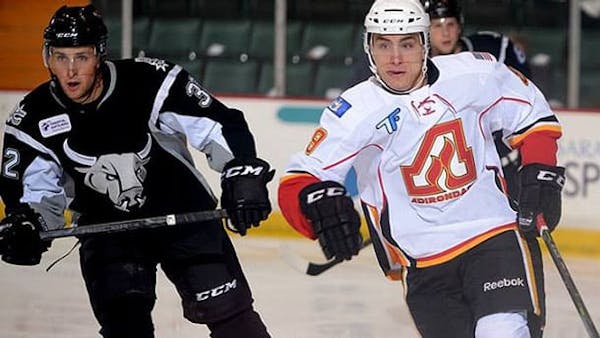 CALGARY FLAMES ASSIGN SHORE, RECALL WOTHERSPOON