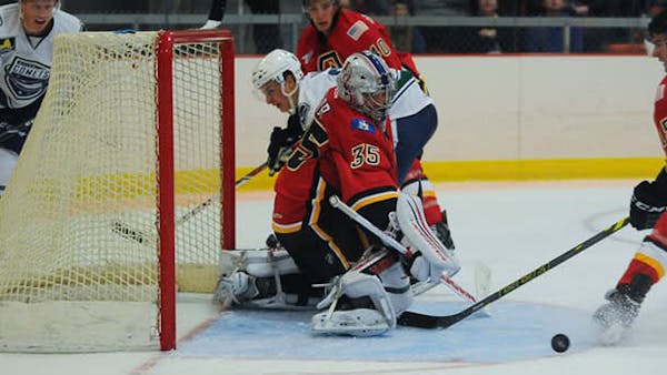 FLAMES RECALL CARR FROM COLORADO