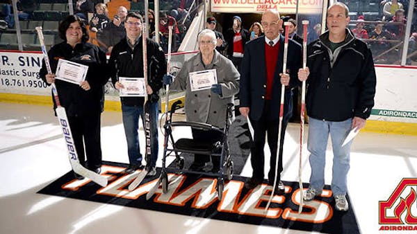 FLAMES HONOR LOCAL HOCKEY HEROES