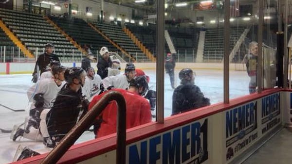 TRAINING CAMP OPENS