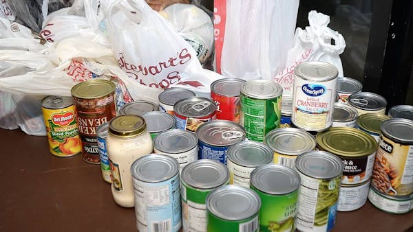 ADIRONDACK THUNDER DONATE OVER 1,500 CANS & COATS