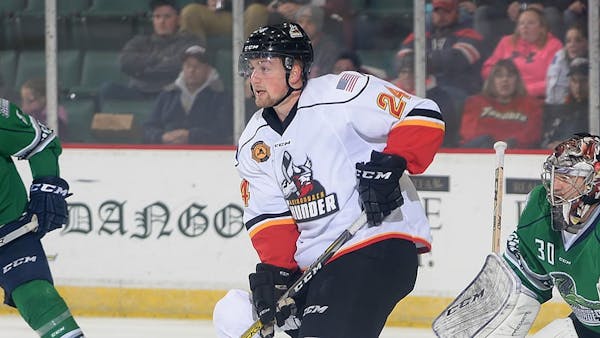 TY LONEY SIGNS PTO WITH CHICAGO WOLVES