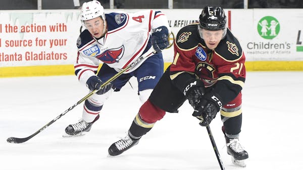 Atlanta extends point streak to franchise record in OT win