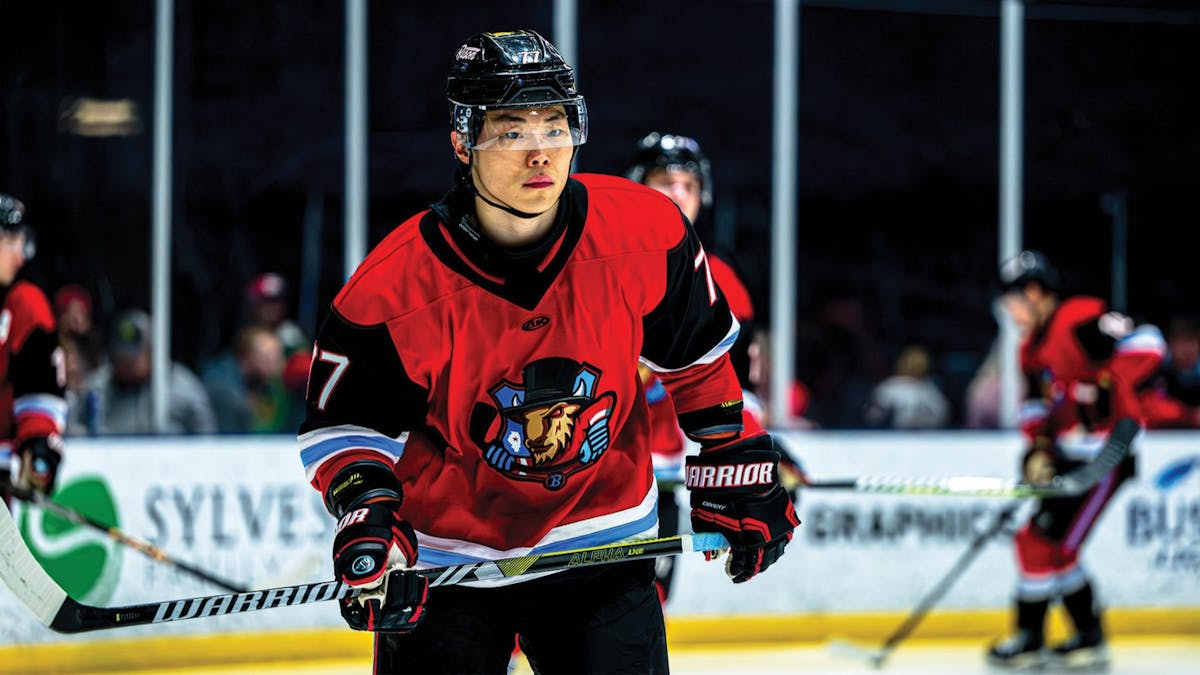 Action photo of Chongmin Lee of the Bloomington Bison