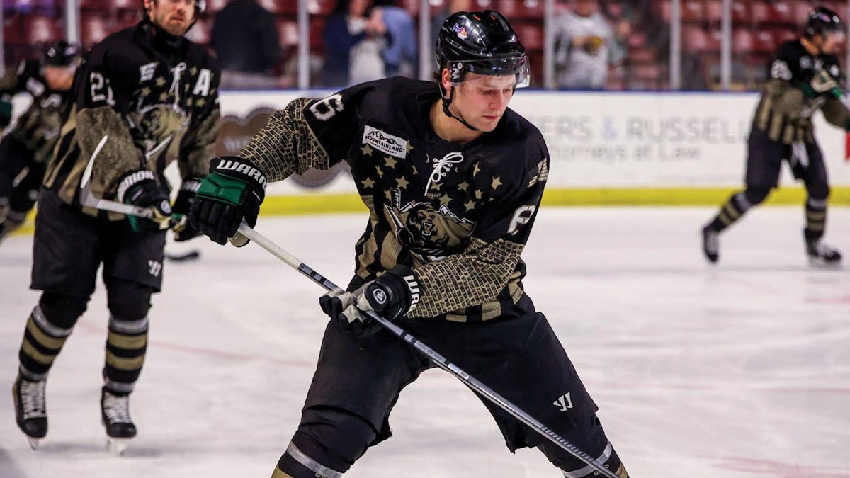 Action photo of Max Neill of the Utah Grizzlies