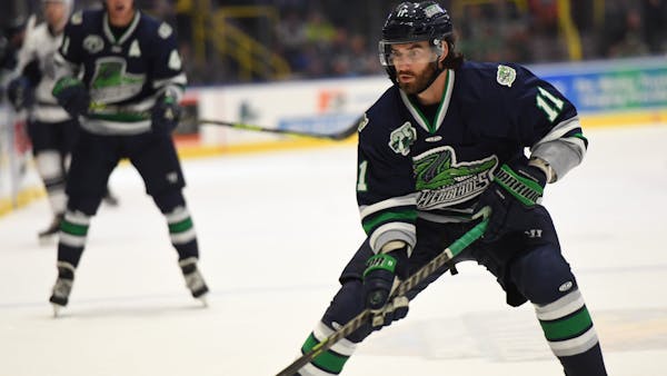 WINIECKI’S LAST-MINUTE GOAL MELTS THE ICEMEN