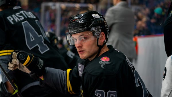 Stallard nets two but Lions win it in OT, 5-4