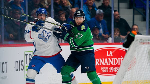 MARINERS CLAIM OPENING NIGHT IN OVERTIME