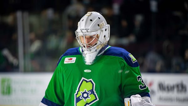 BOOTH SHINES AGAIN AS MALATESTA PLAYS OT HERO