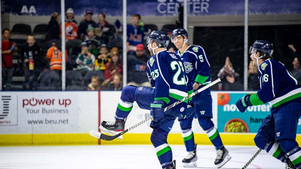 KILE SCORES FOUR IN SEASON DEBUT AS MARINERS WIN WILD ONE