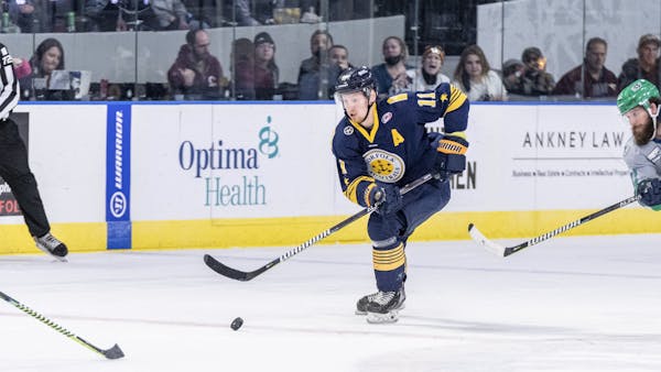 Lang Return to Norfolk From Chicago
