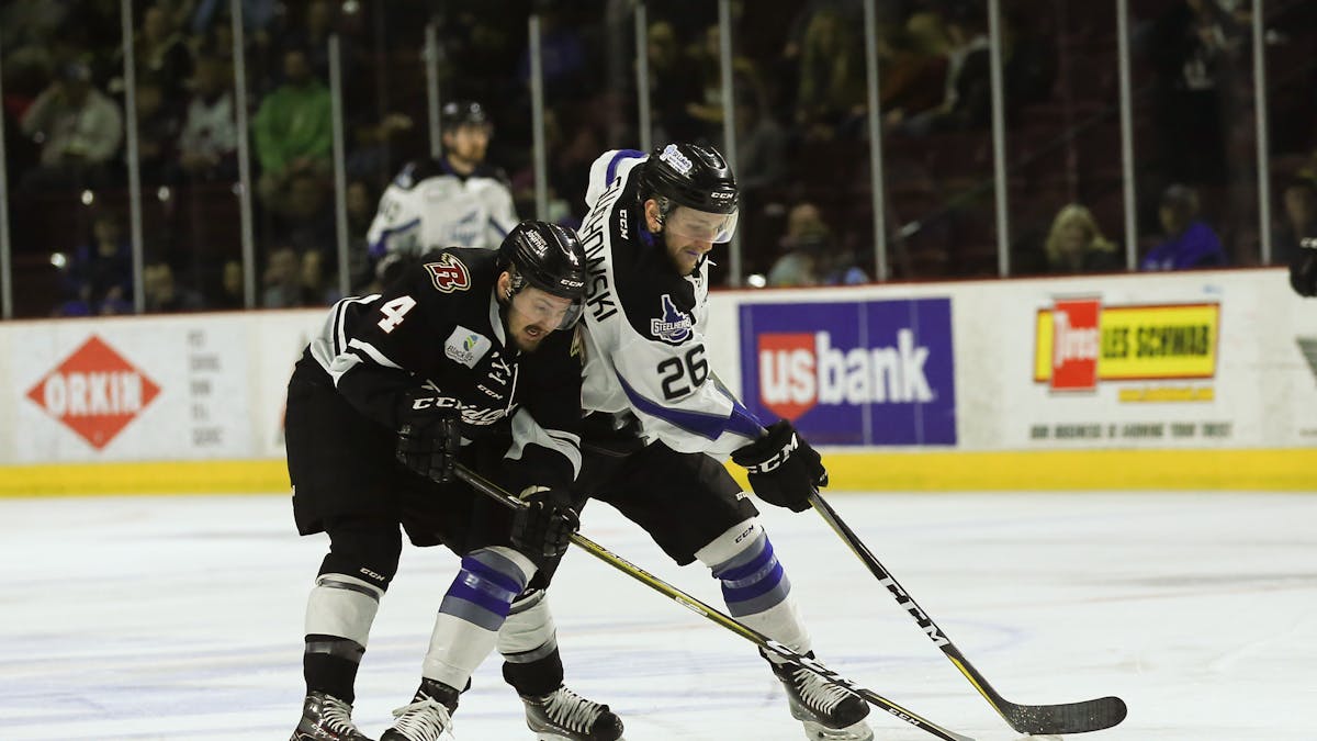 POULSEN’S BAR-DOWN SHOT GETS RUSH OVERTIME WIN