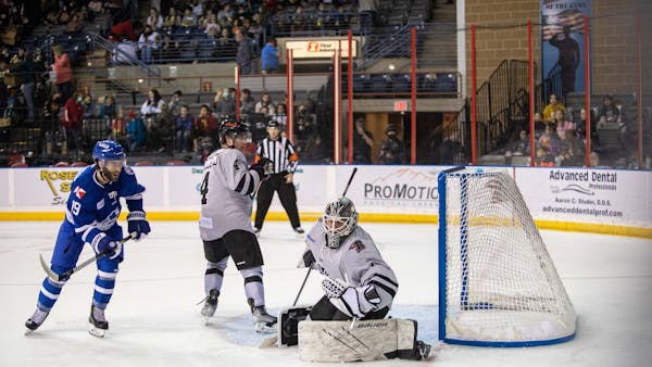 RUSH FALL IN OT IN FRONT OF CAPACITY, KIDS DAY CROWD, 3-2