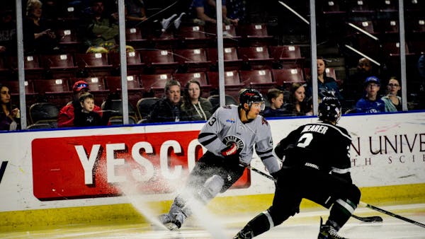 RUSH DROP GRIZZLIES, 4-3, TAKE OVER DIVISION LEAD