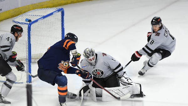 RUSH SETTLE FOR A POINT IN OT LOSS AT GREENVILLE, 5-4