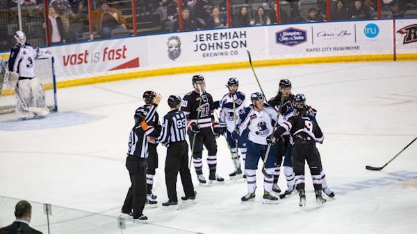 RUSH BEAT OILERS, 5-2, CLINCH PLAYOFF BERTH