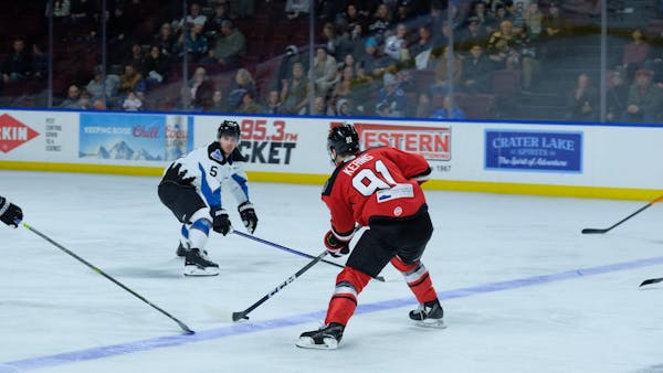 LAVIGNE, KERINS, TO AHL CALGARY
