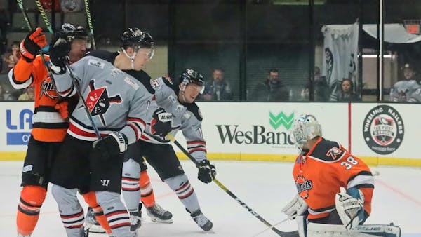 Harvey's Hot Goaltending Spoils Home Opener
